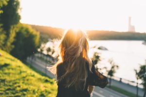 Women sitting watching the sunset outside